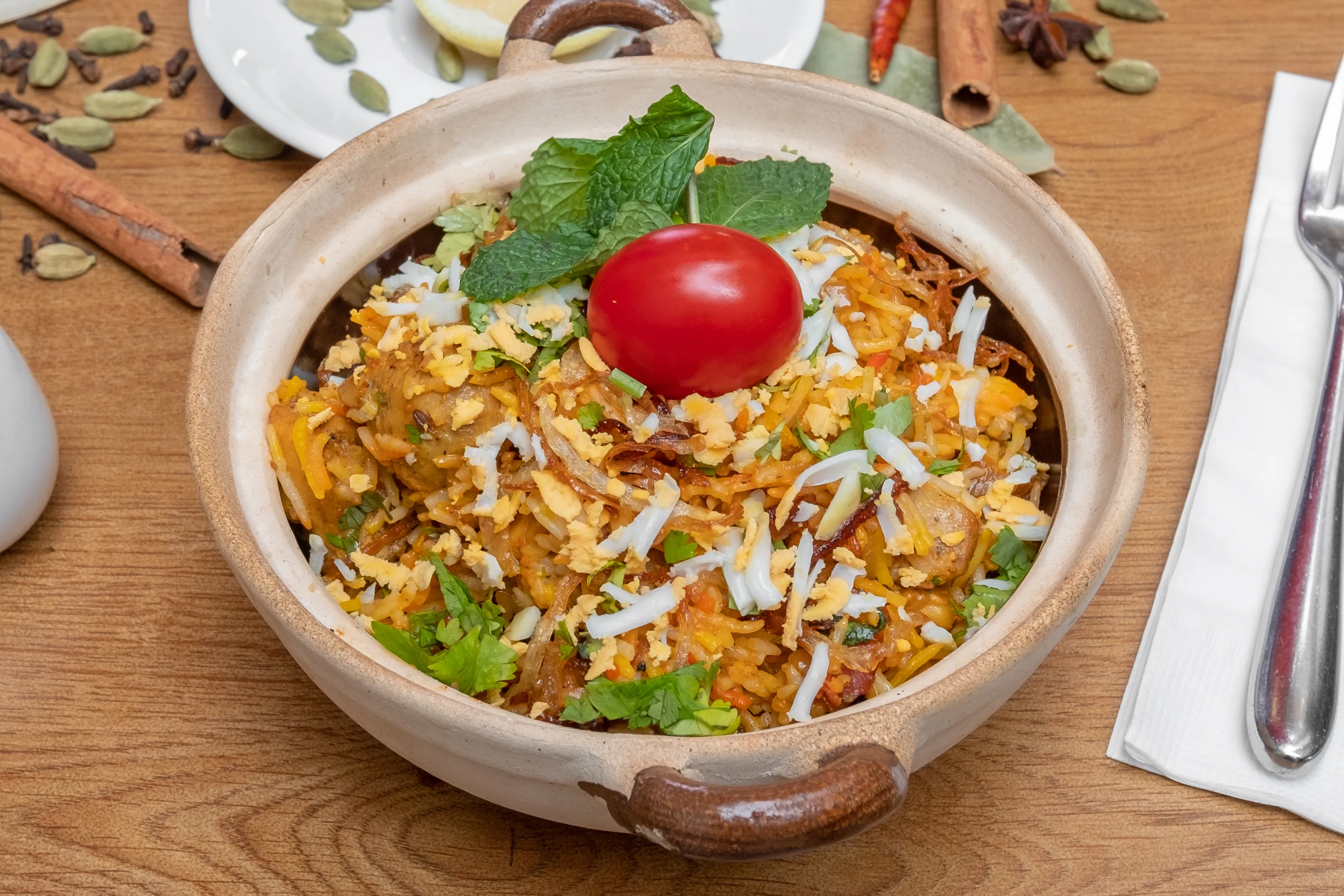 The claypot biryani, seal opened at the table